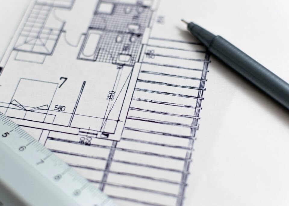Floor plan drawing with a pen