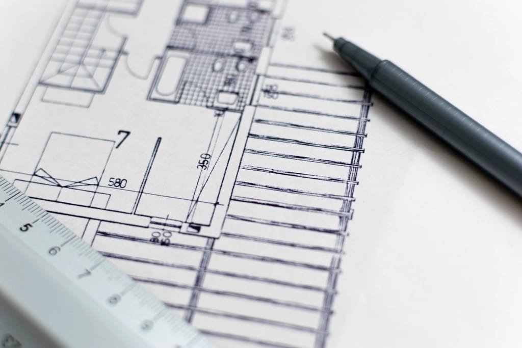 Floor plan drawing with a pen